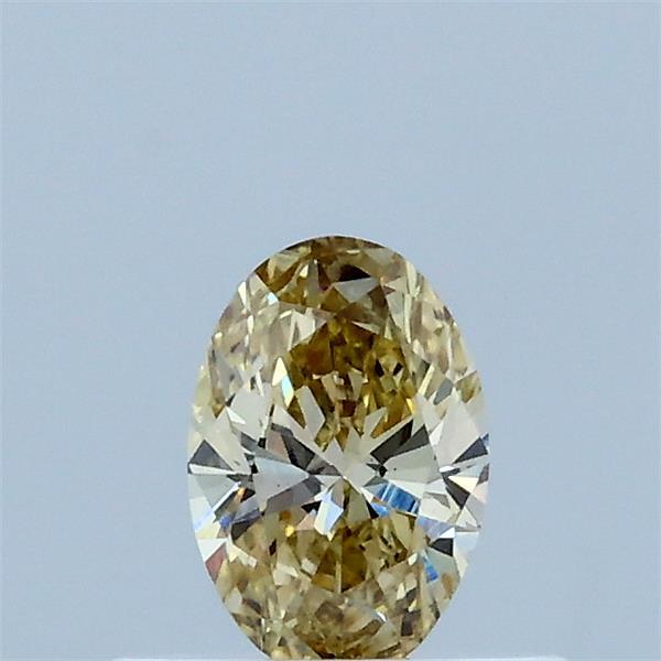 Actual 0.33 carat Fancy Yellow Oval lab-grown diamond