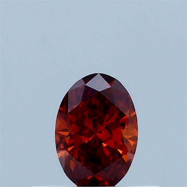 Actual 0.31 carat Fancy Vivid Orange Oval lab-grown diamond