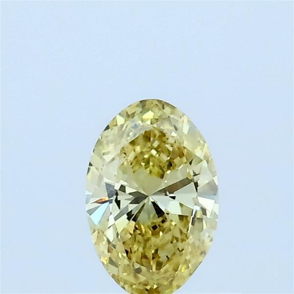 Actual 0.31 carat Fancy Intense Yellow Oval lab-grown diamond