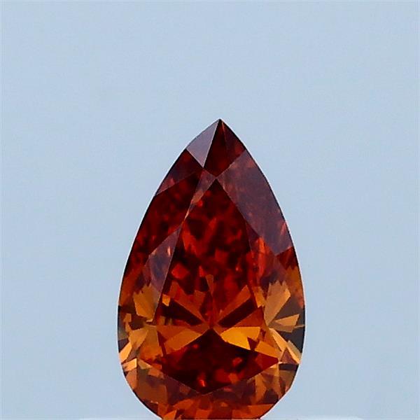 Actual 0.32 carat Fancy Vivid Orange Pear lab-grown diamond