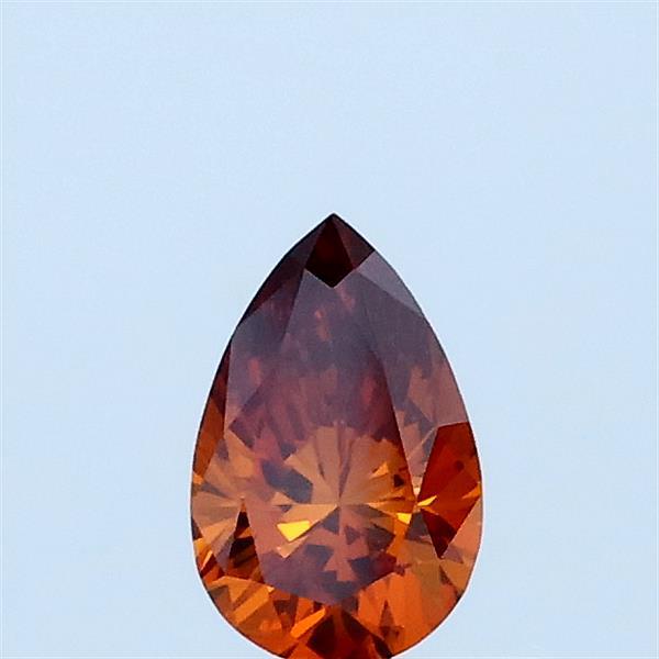 Actual 0.31 carat Fancy Vivid Brownish Orange Pear lab-grown diamond