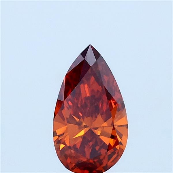 Actual 0.31 carat Fancy Vivid Orange Pear lab-grown diamond