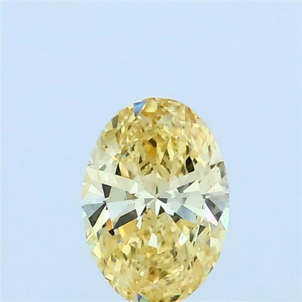 Actual 0.39 carat Fancy Intense Yellow Oval lab-grown diamond