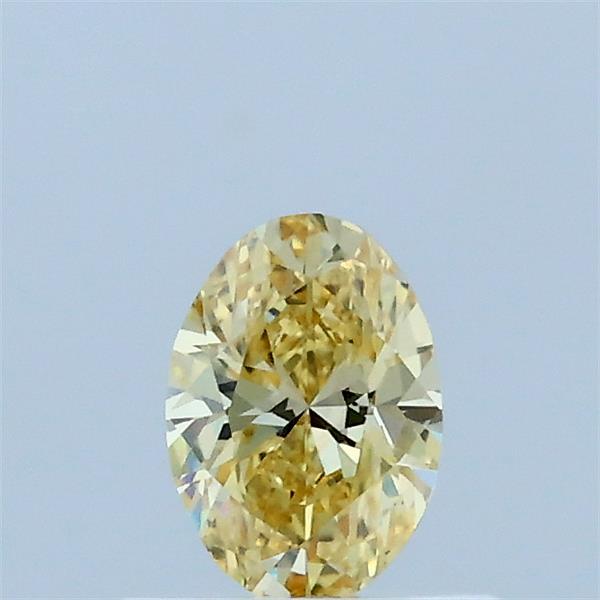 Actual 0.35 carat Fancy Yellow Oval lab-grown diamond