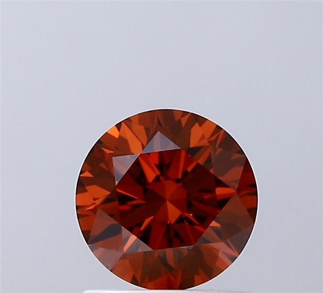 Fancy orange diamond with vibrant fiery hue and brilliant sparkle in fine jewelry setting